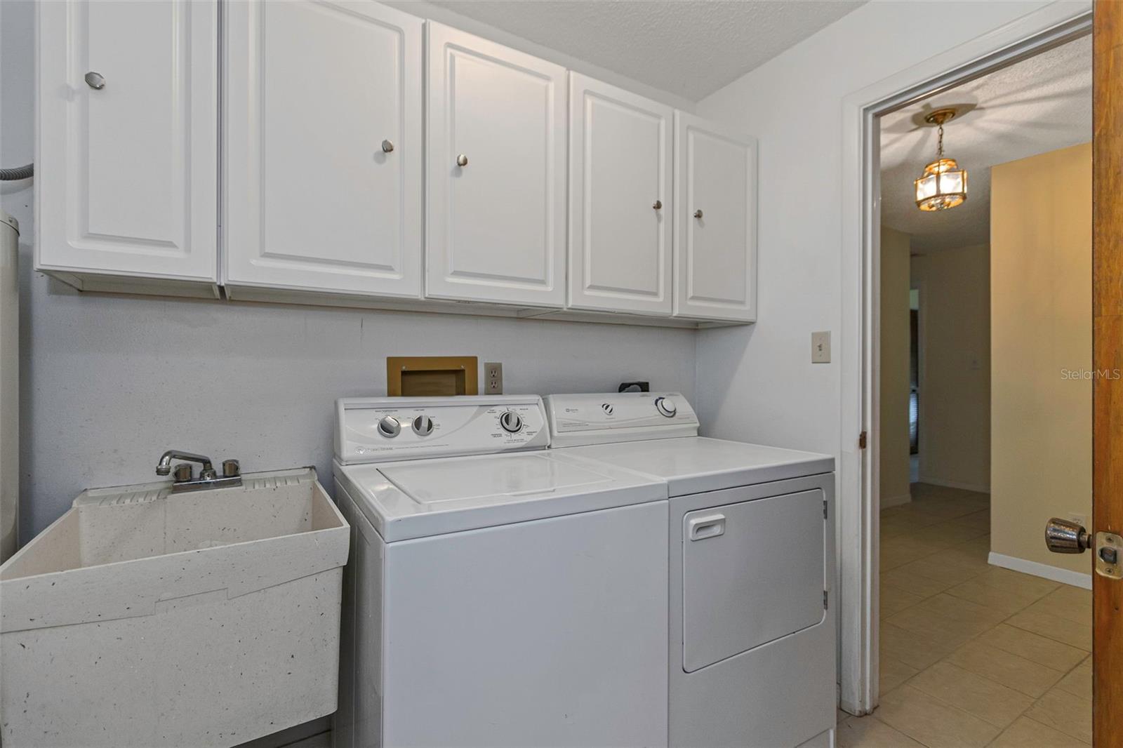 Laundry room with utility sink