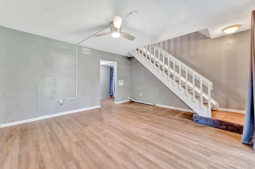 The extra living room/ flex and the laundry area