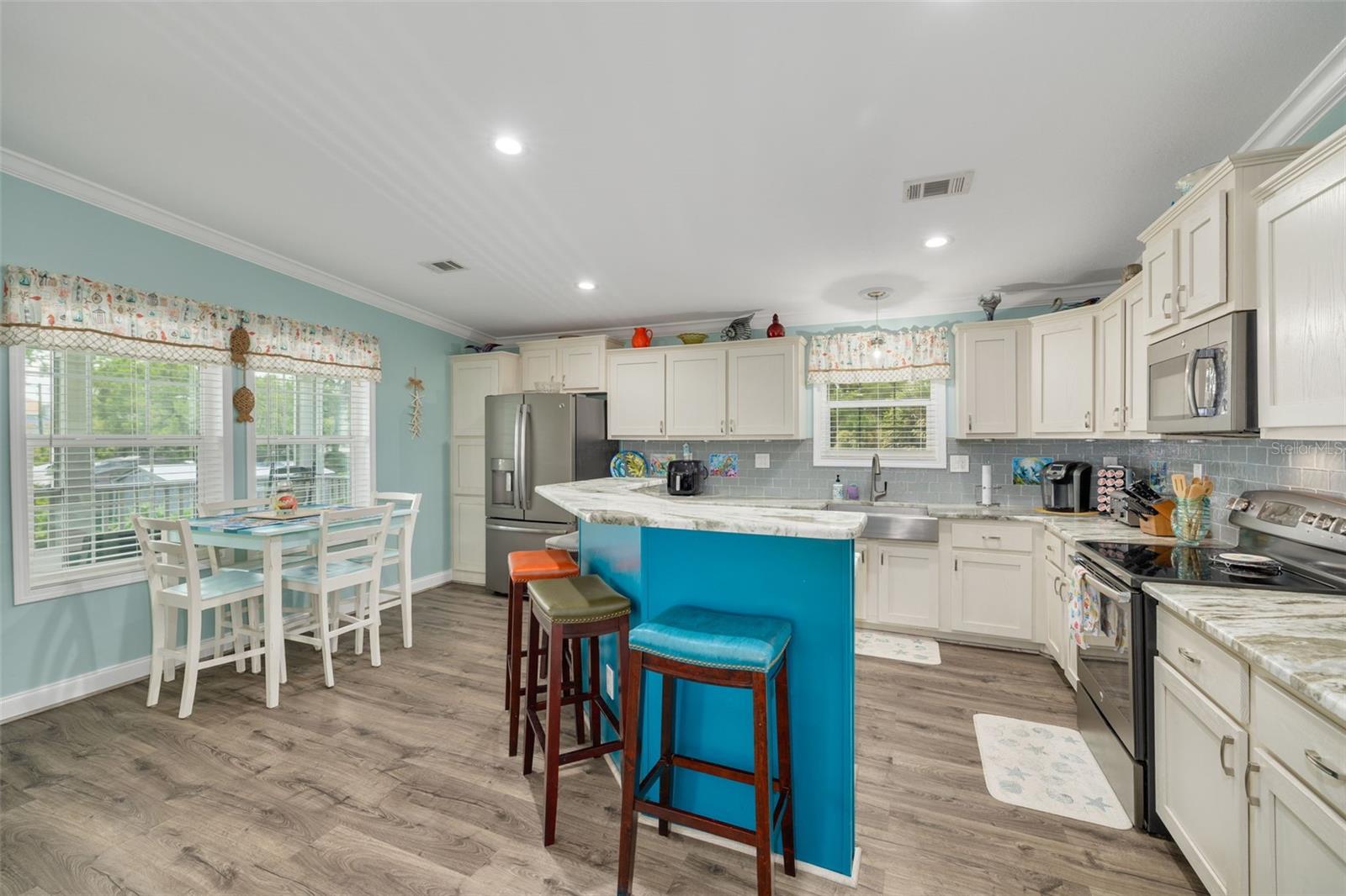 Kitchen with breakfast bar and eat in area