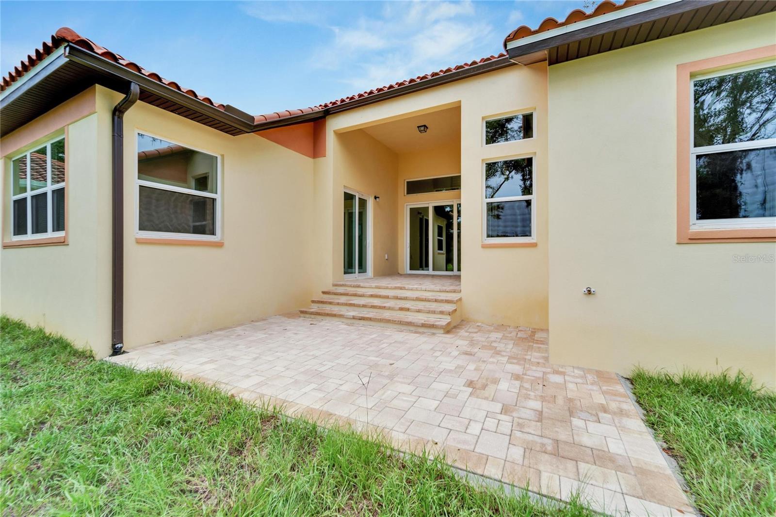 Brick-paved rear patio