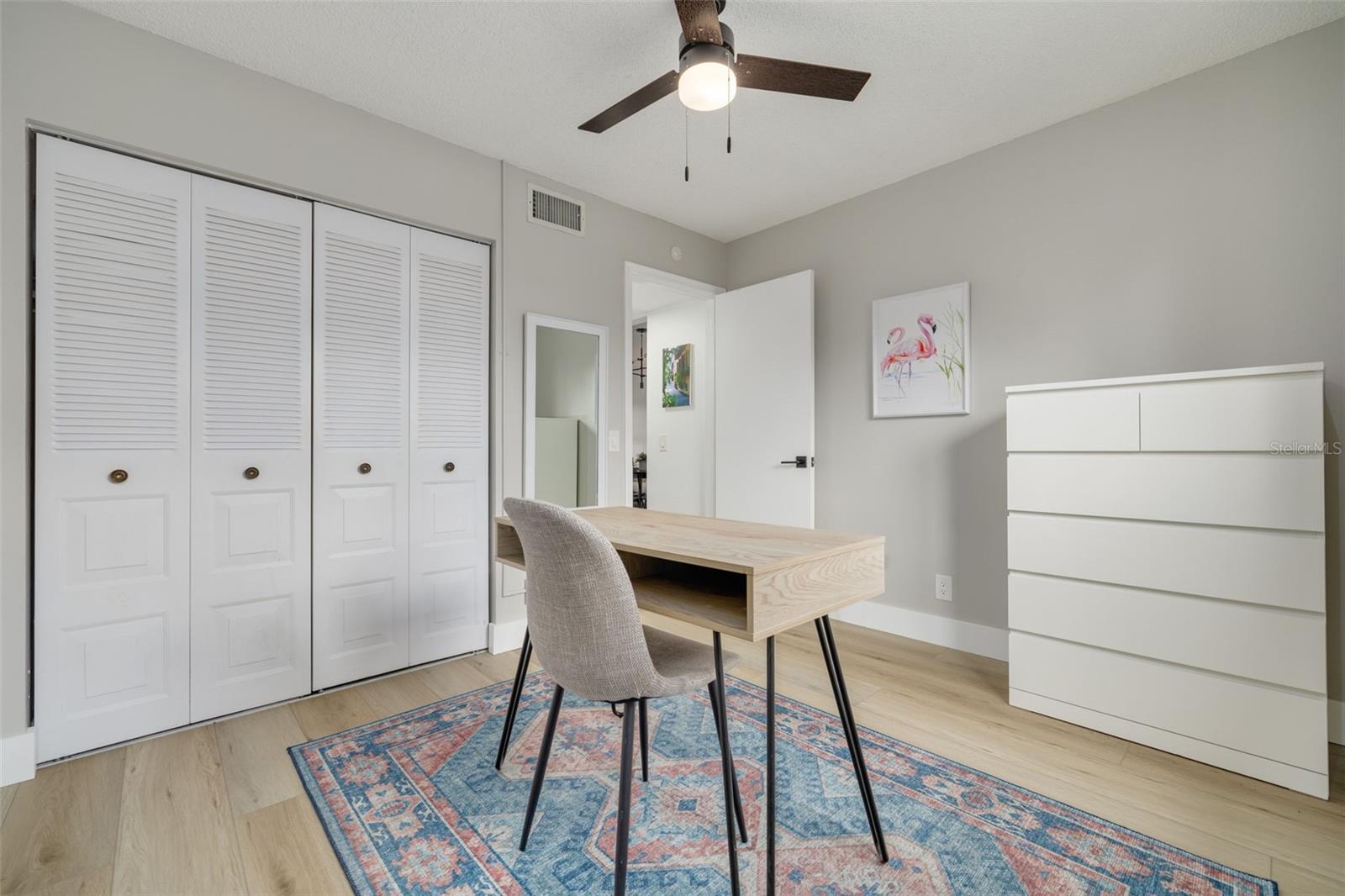 Guest bedroom with built-in closet