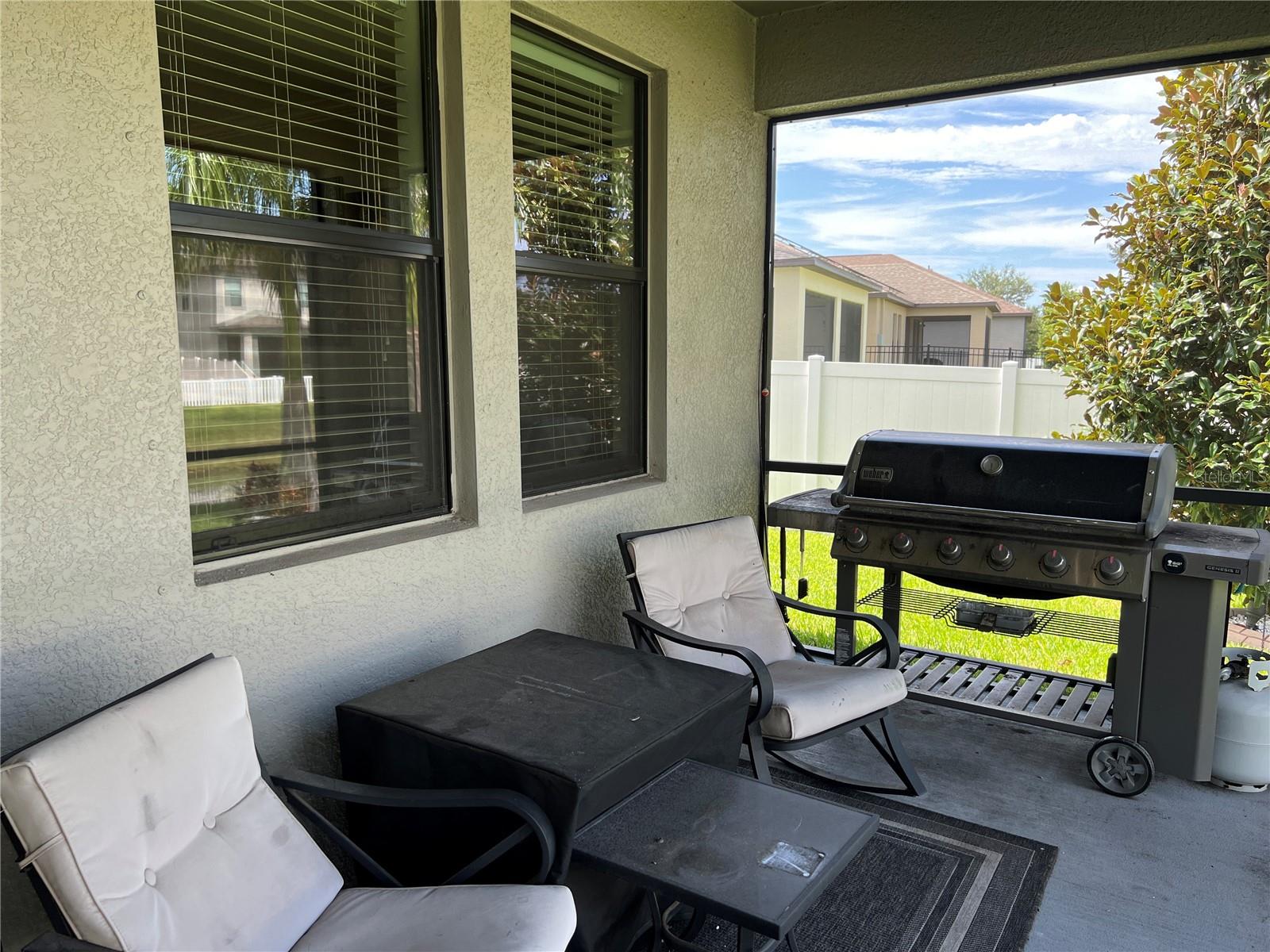 Screened patio overlooking pond