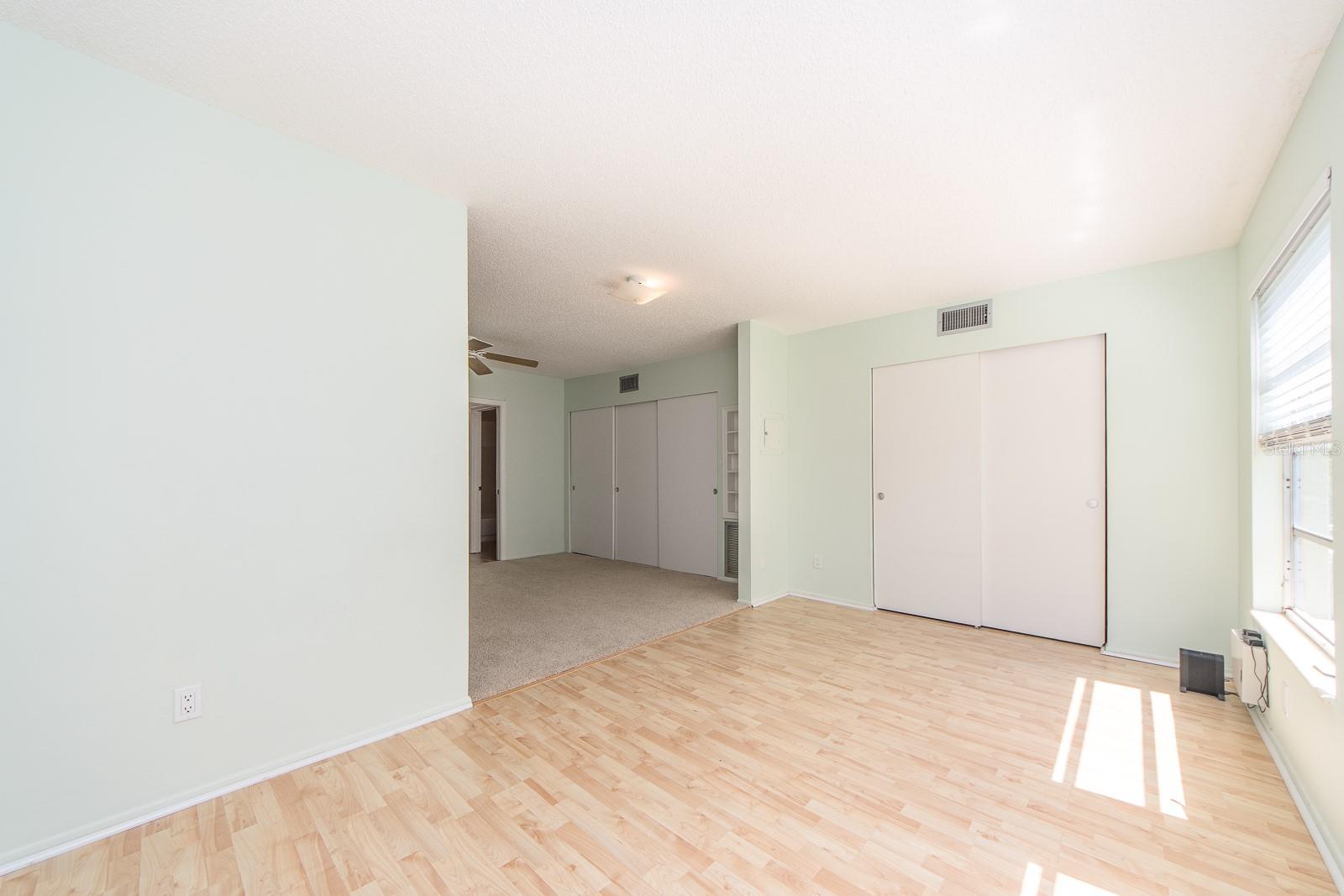 LARGE SUNROOM WITH LOTS OF CLOSET SPACE