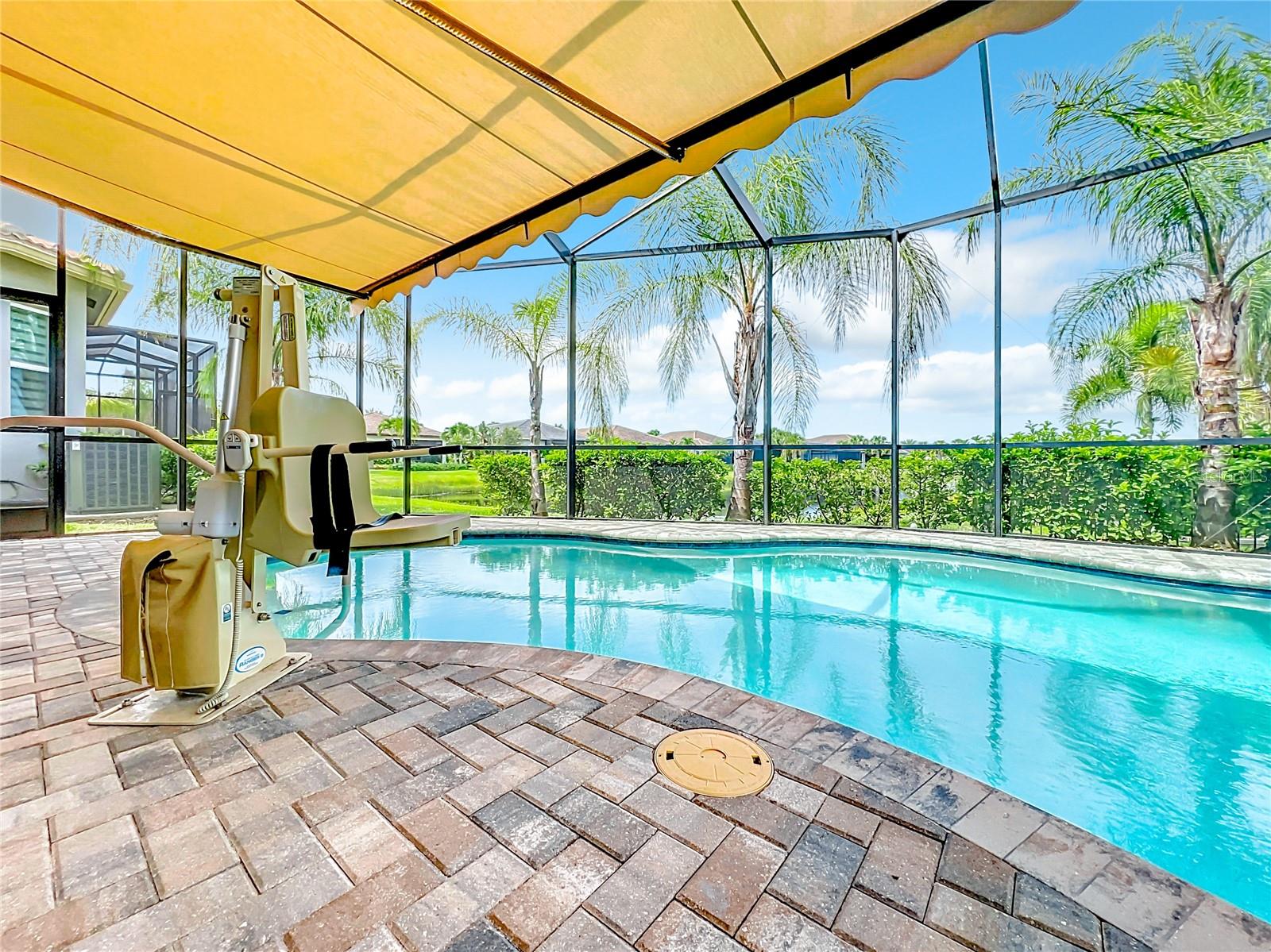 Retractable Awning and Power Chair Lift for Pool