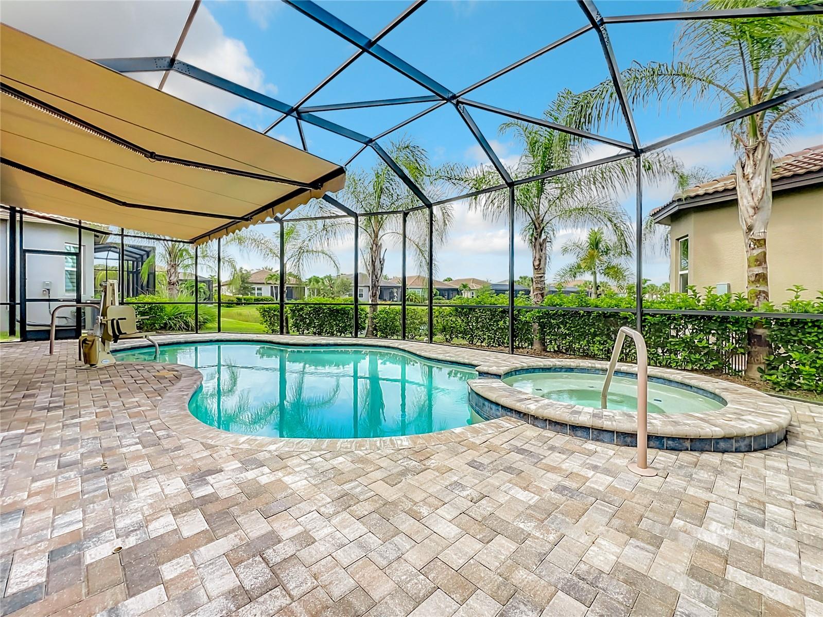 Pool/Spa/Patio with Retractable Awning and Power Chair Lift