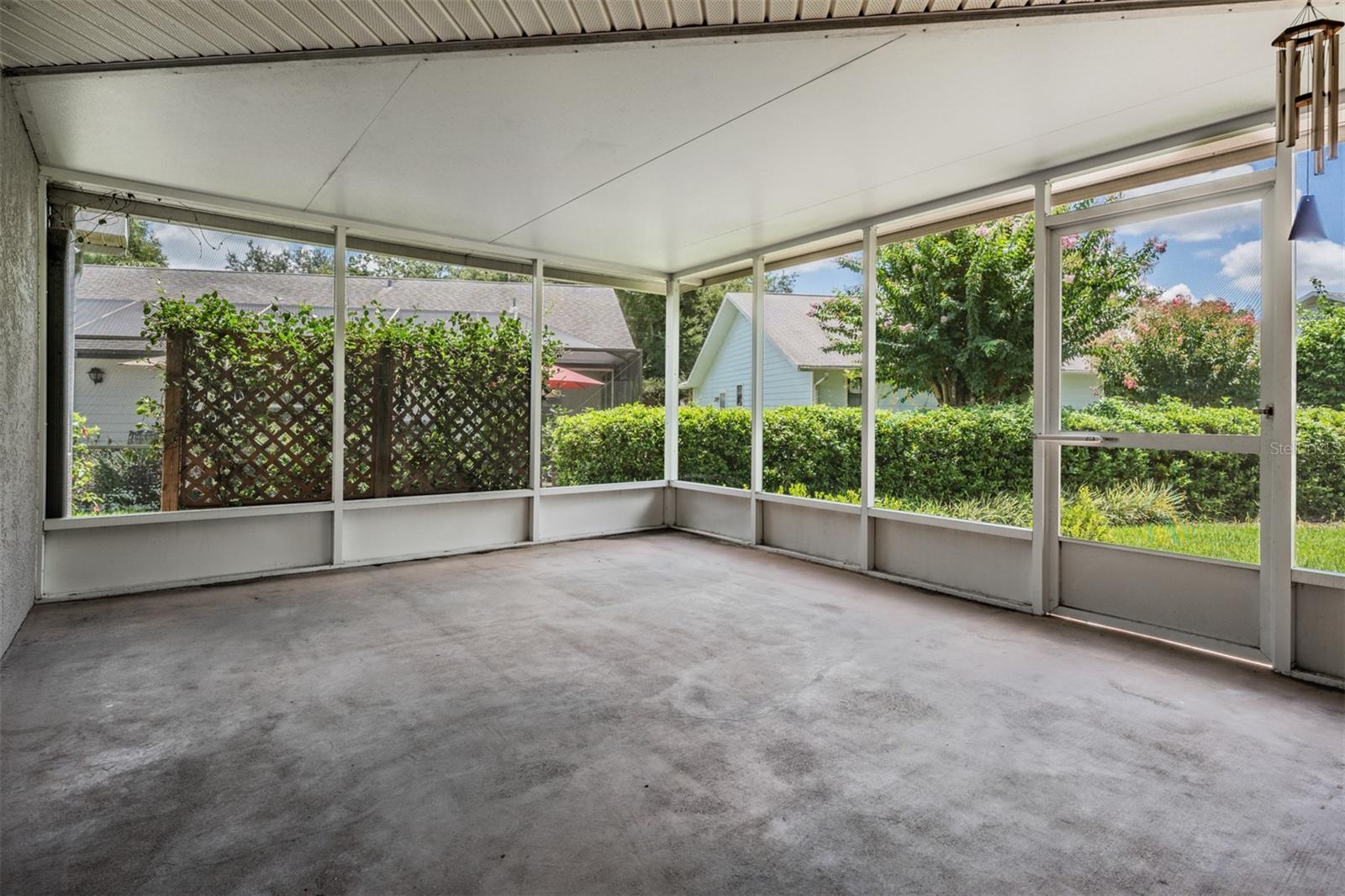 Screened lanai with insulated roof and ceiling fan