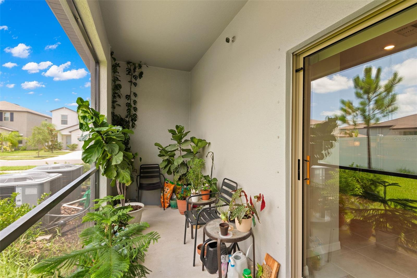 Screened patio area off of kitchen