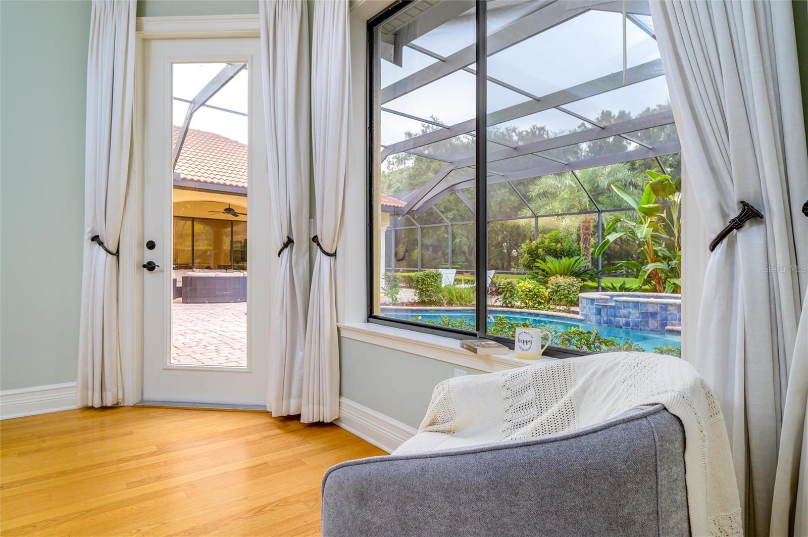 Master Downstairs Bedroom overlooks the Pool