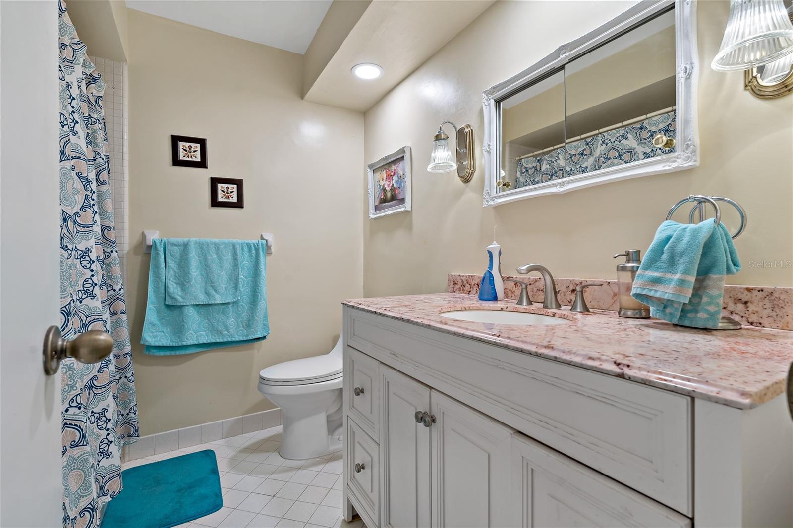 GUEST BATHROOM WITH SHOWER/TUB COMBO!