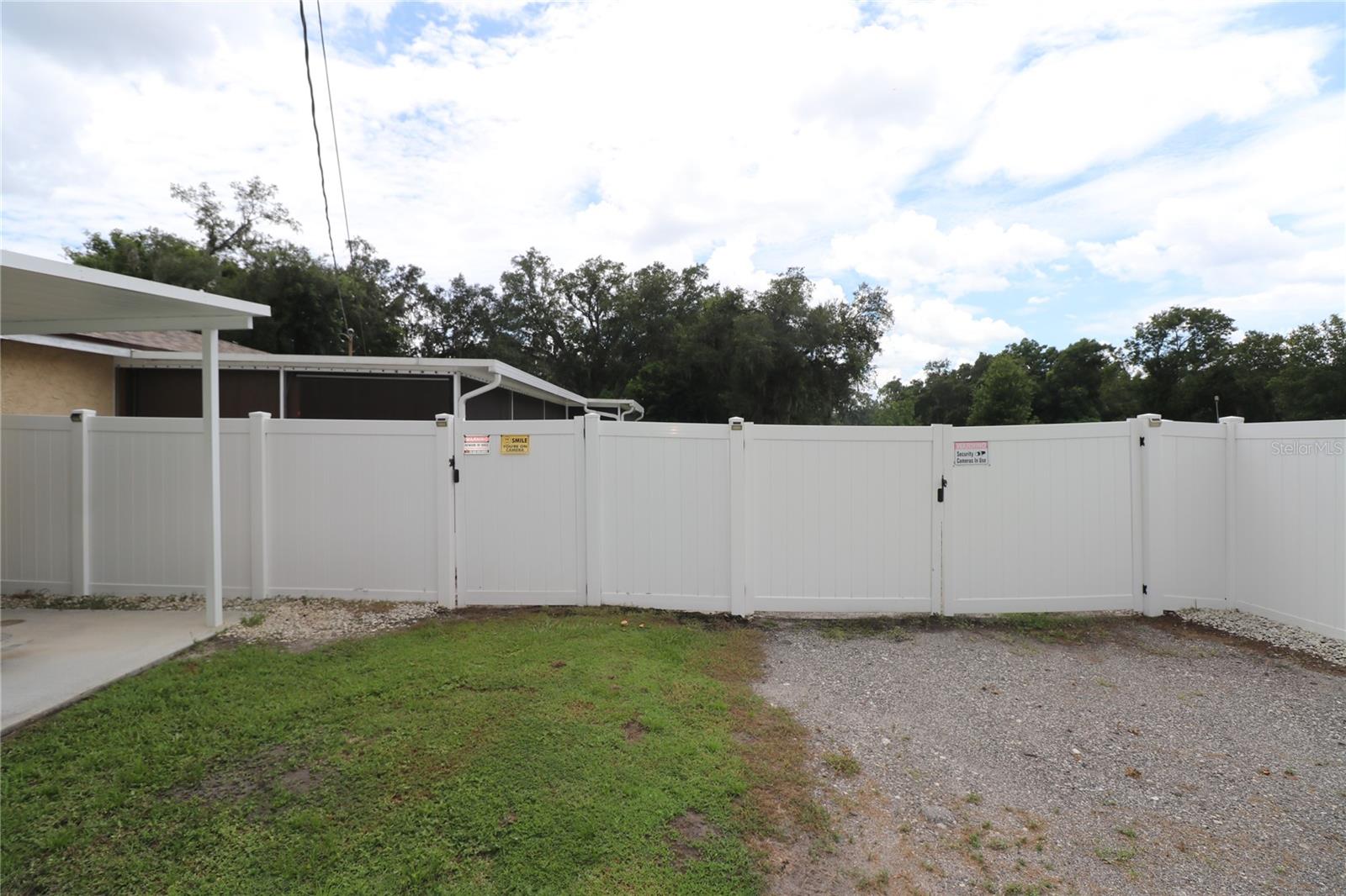 Vehicle gate on West side of property