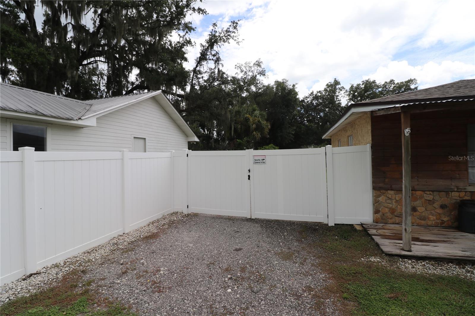 Vehicle gate on East side of property