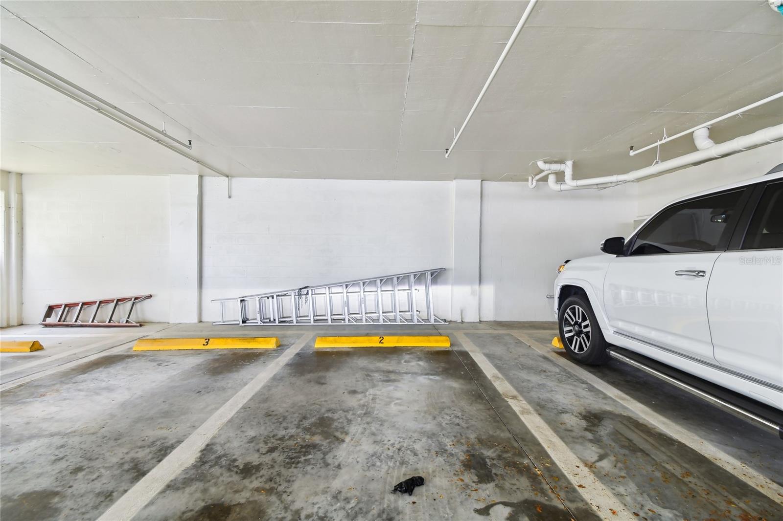 Your condo home comes with gated under-building parking space #2