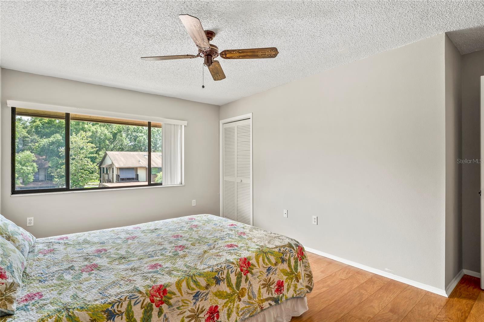 The primary bedroom has two closets, this one has shelves.