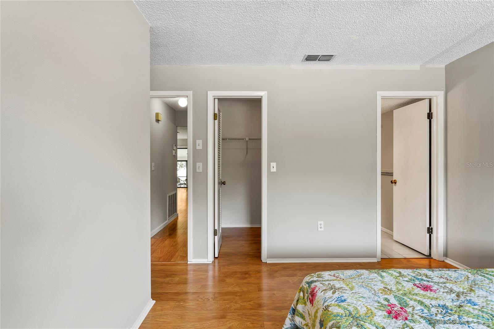 Primary bedroom has a walk-in closet, also an ensuite bathroom.