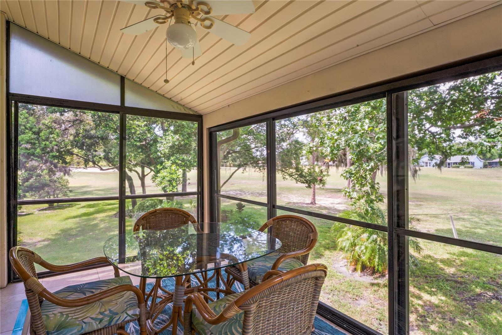 This is the back balcony that has sliding windows and screens overlooking the golf course.