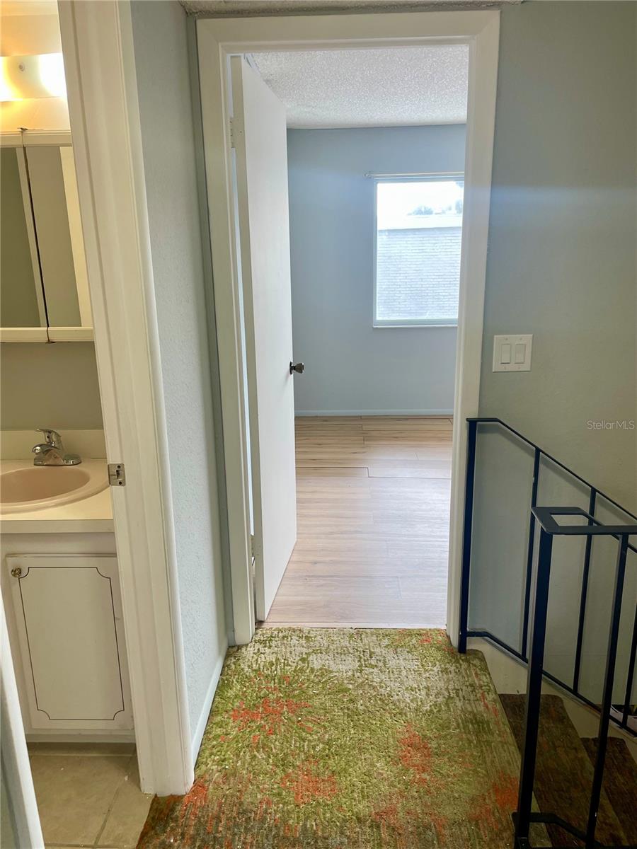 Looking down hallway to Primary bedroom