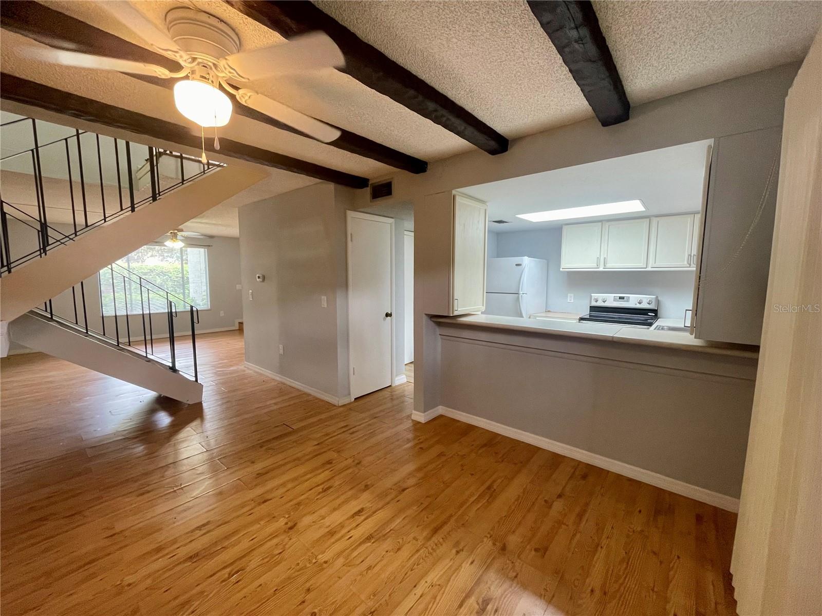 dining area with a kitchen pass through