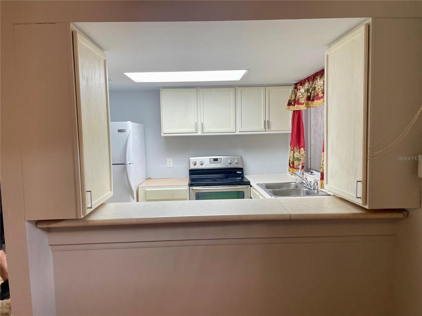 Looking into the kitchen from dining rooom