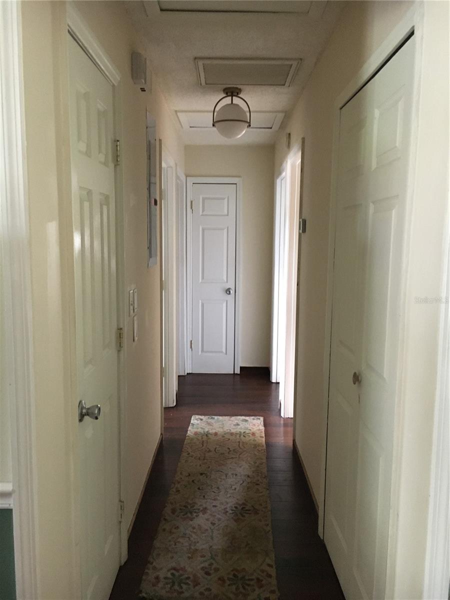 Hallway with many closets