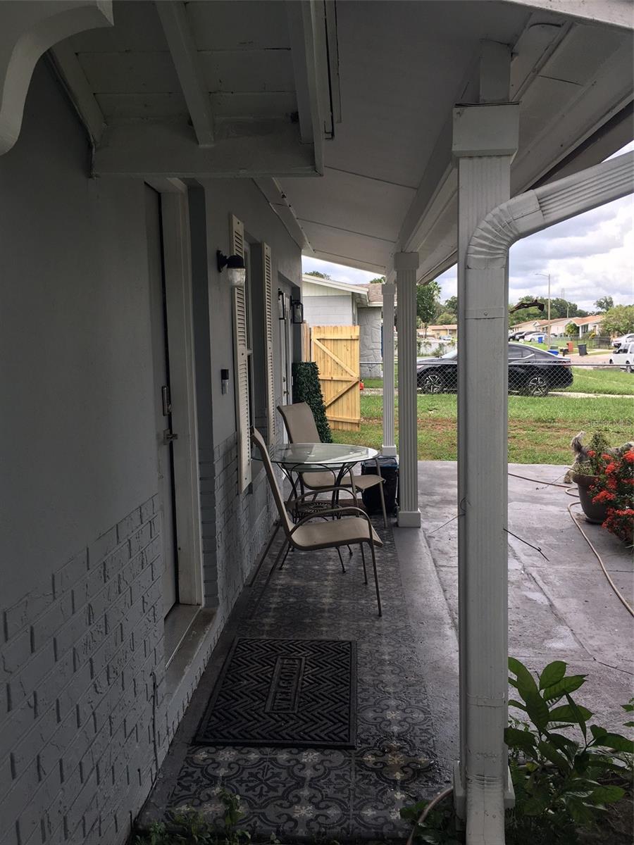 Side view of porch sitting area and table