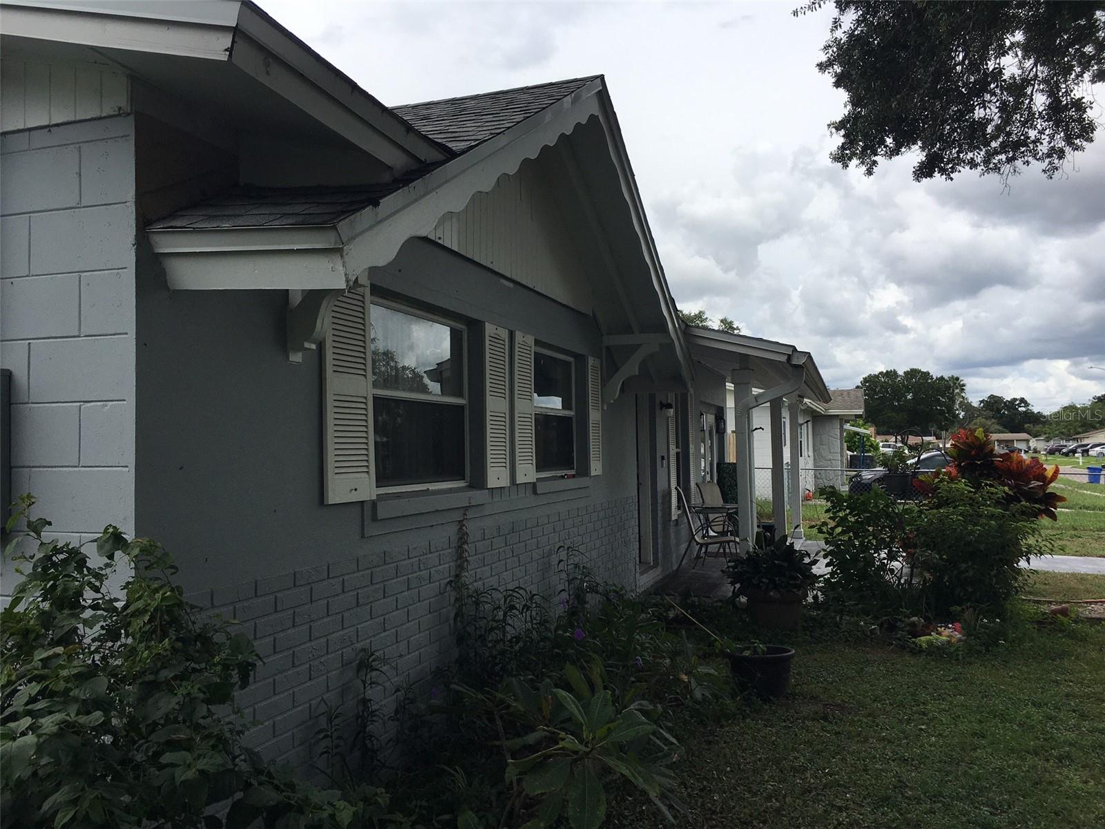 Front corner of house looking North