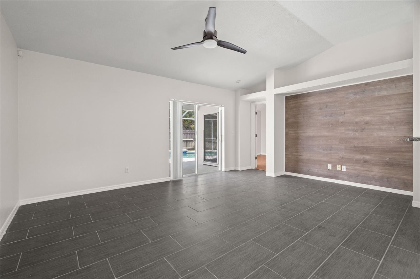 Large Family Room with Brand New Ceramic Tile Floors, Open Floor Plan and Breakfast Nook and Remodeled Kitchen.