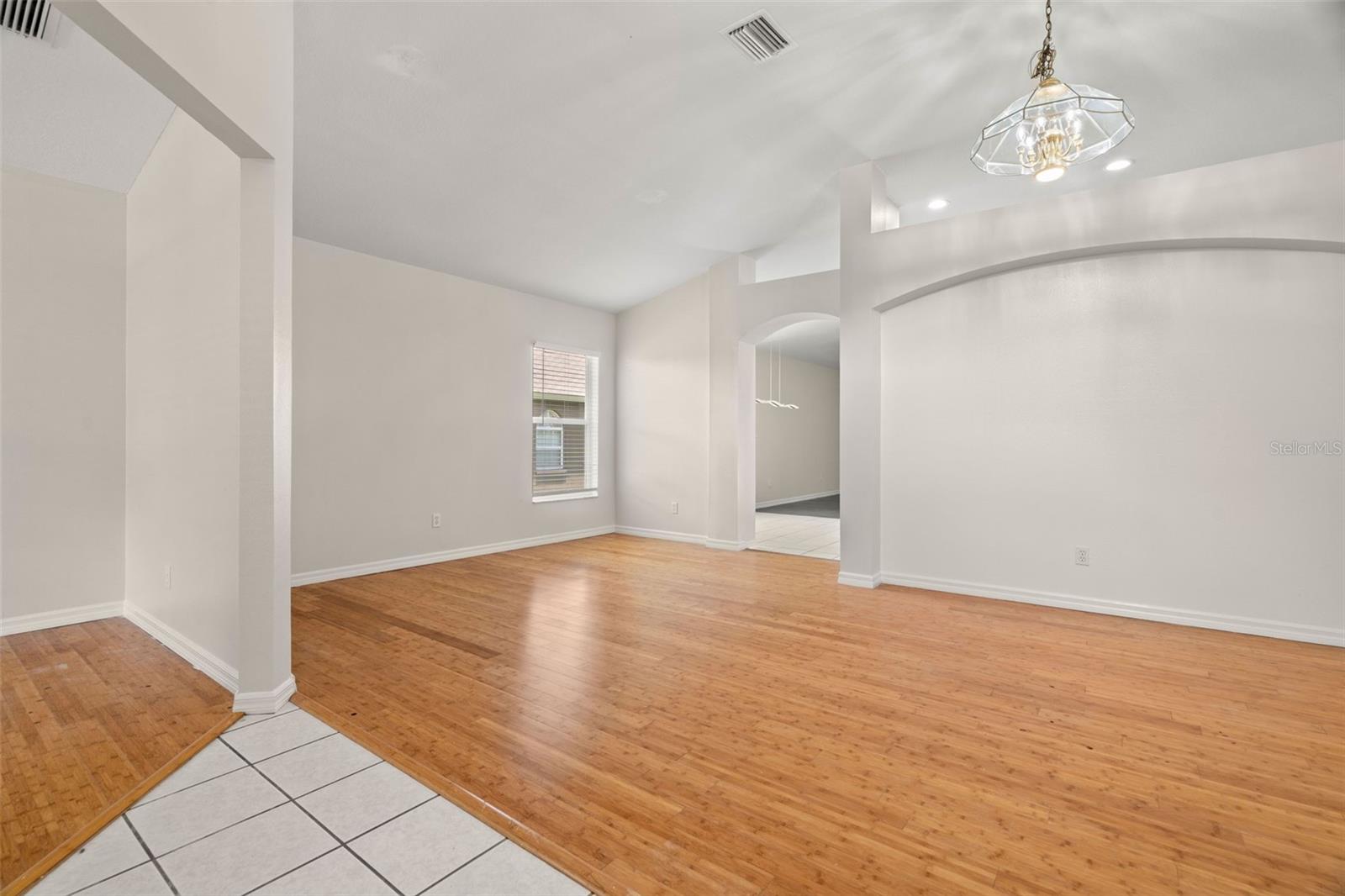 Entrance into Home from Front Door, Ceramic Flooring and Beautiful Bamboo Wood Flooring