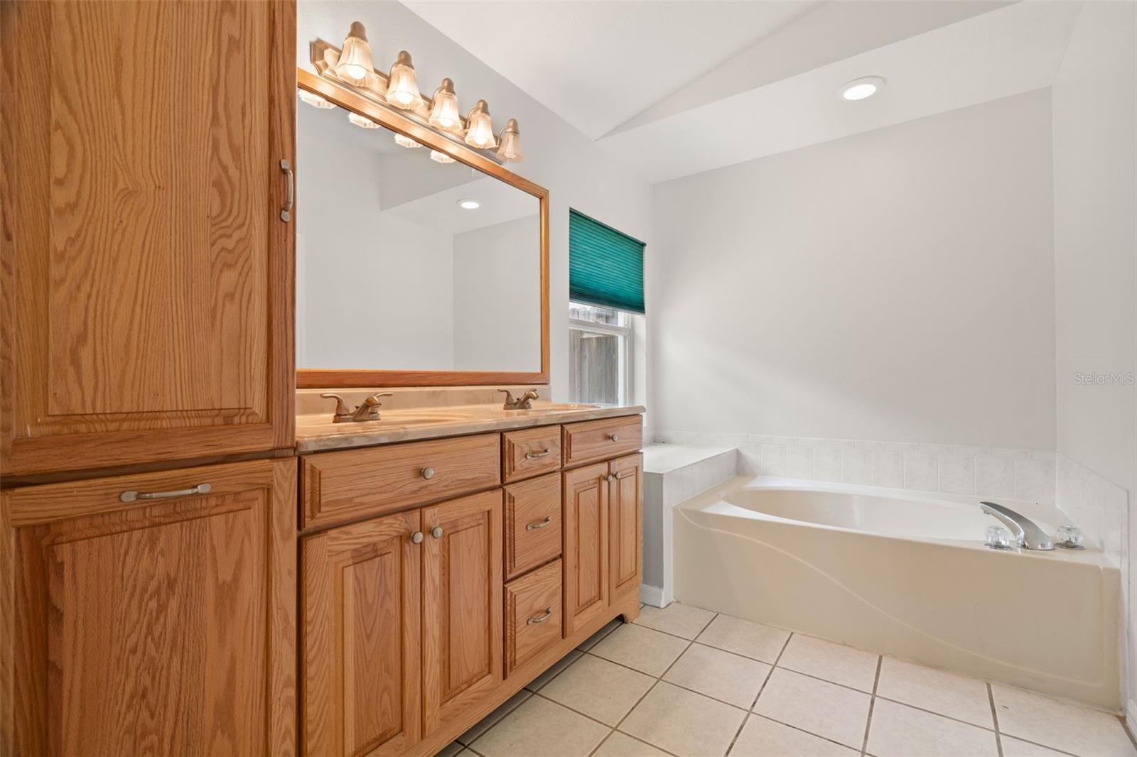 Primary Bathroom with Dual Sinks, New Fixtures, Separate Garden Soaking Tub, Separate Shower