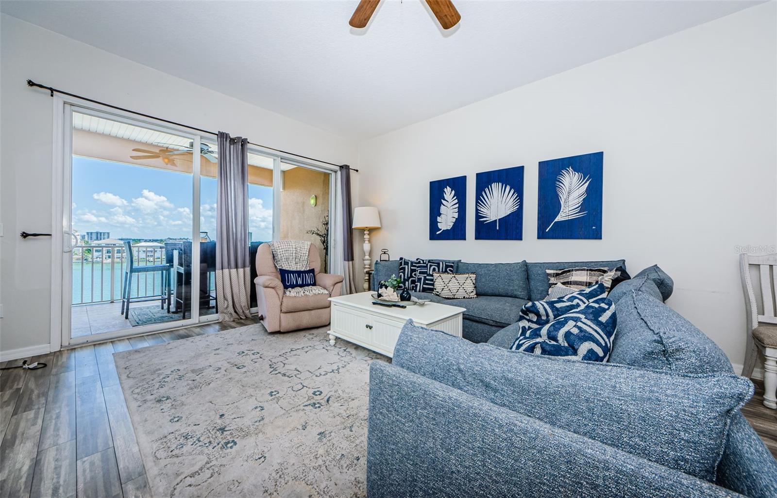 This COASTAL RETREAT comes FULLY FURNISHED!  Tons of natural light, PICTURESQUE WATER VIEWS, a WIDE AND SPACIOUS GREAT ROOM with 10’ ceilings throughout.