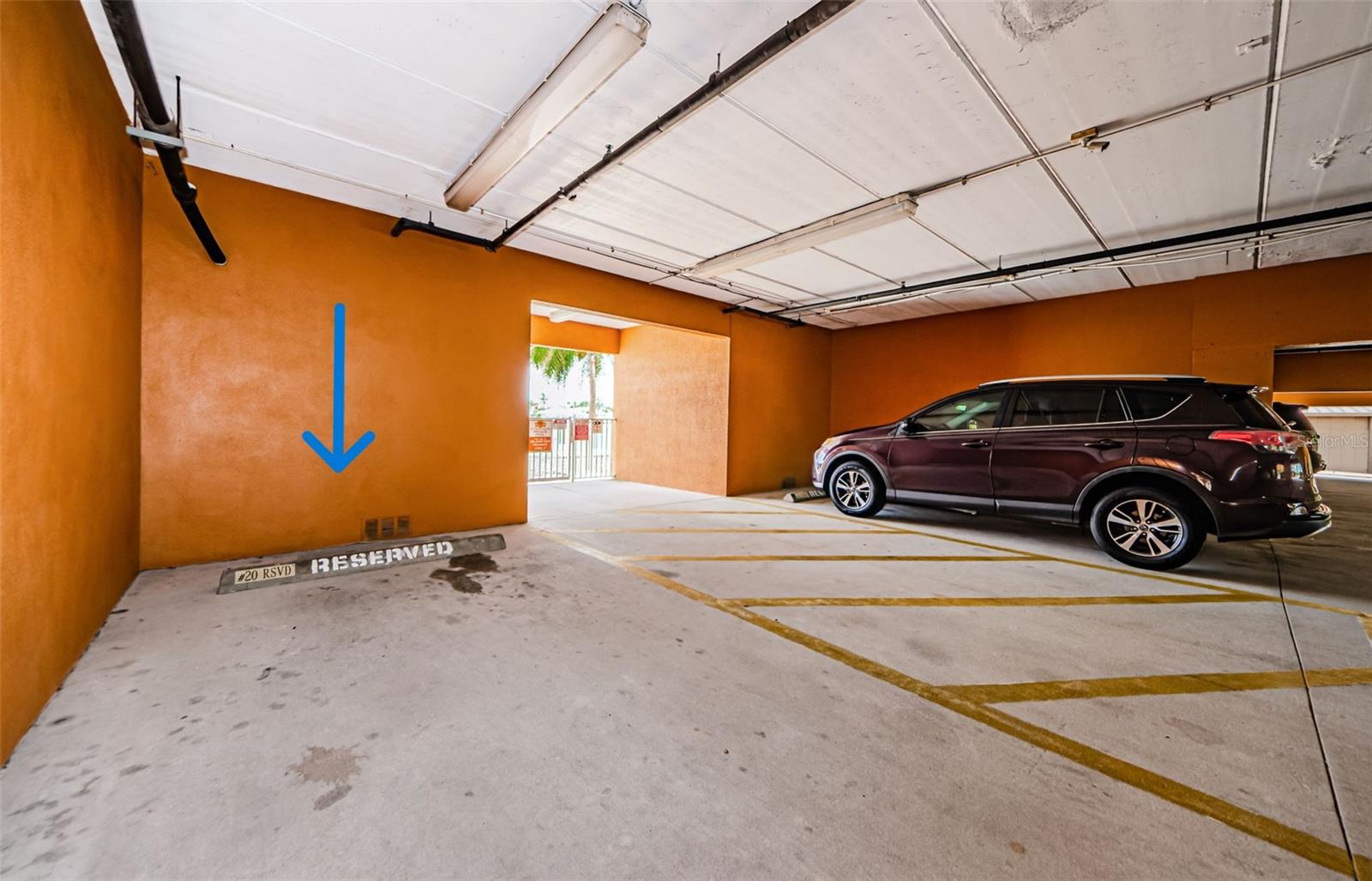 Assigned parking right next to the pool and across from the elevator.