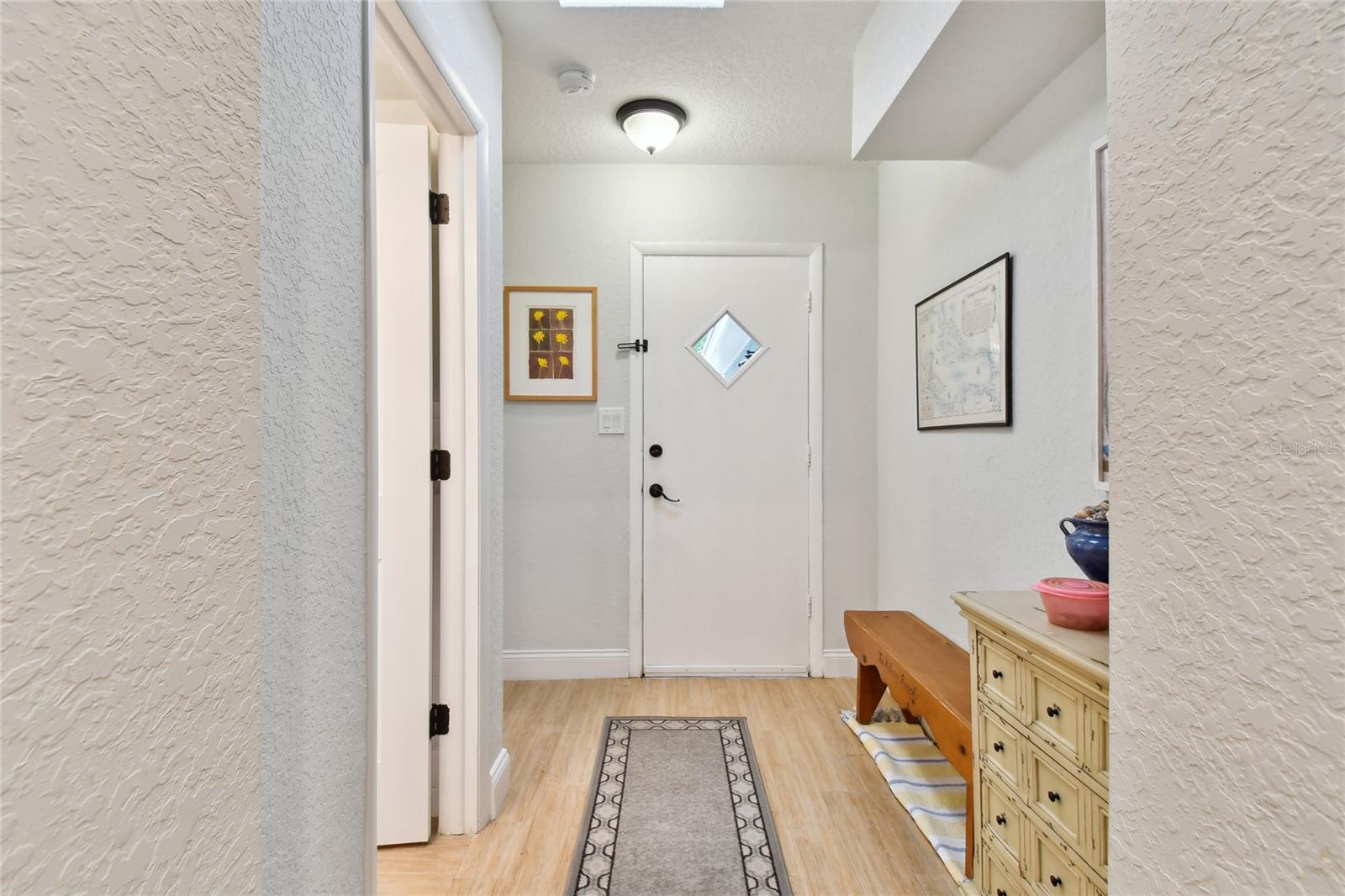 Hallway from Florida Room to 4th bedroom/4th bathroom.