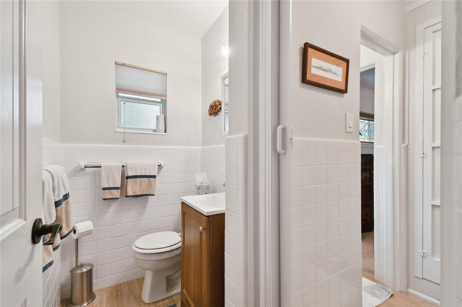 Half bath which connects to original primary bathroom, which is now 2nd bedroom ensuite