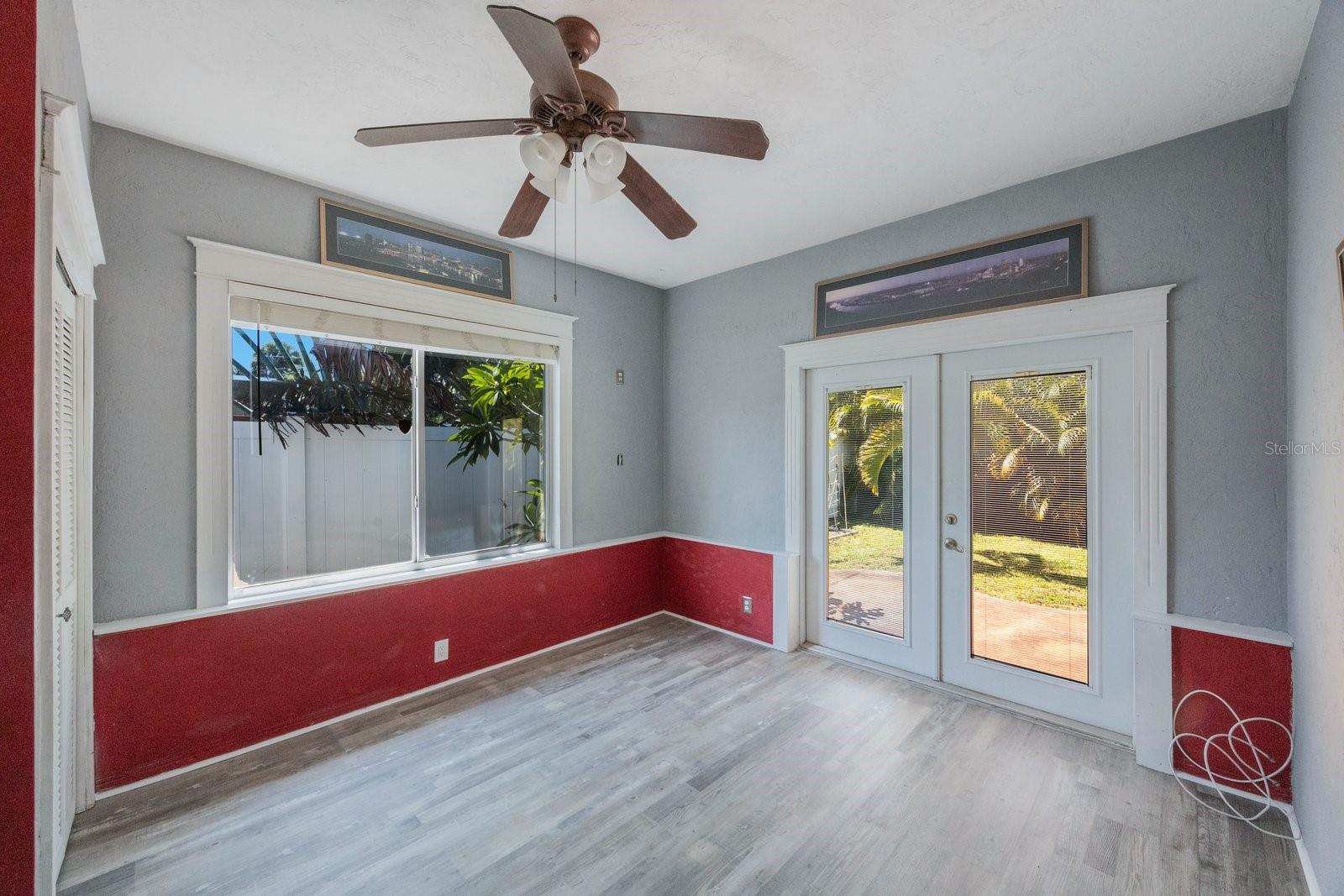 Primary Bedroom featuring side patio access