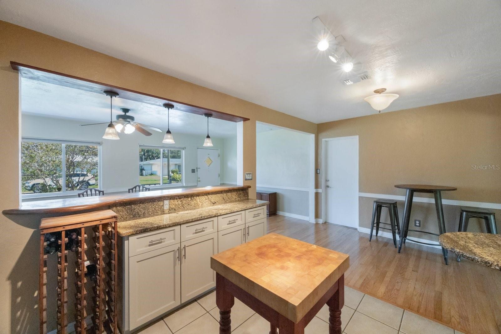 Kitchen featuring bar for entertaining