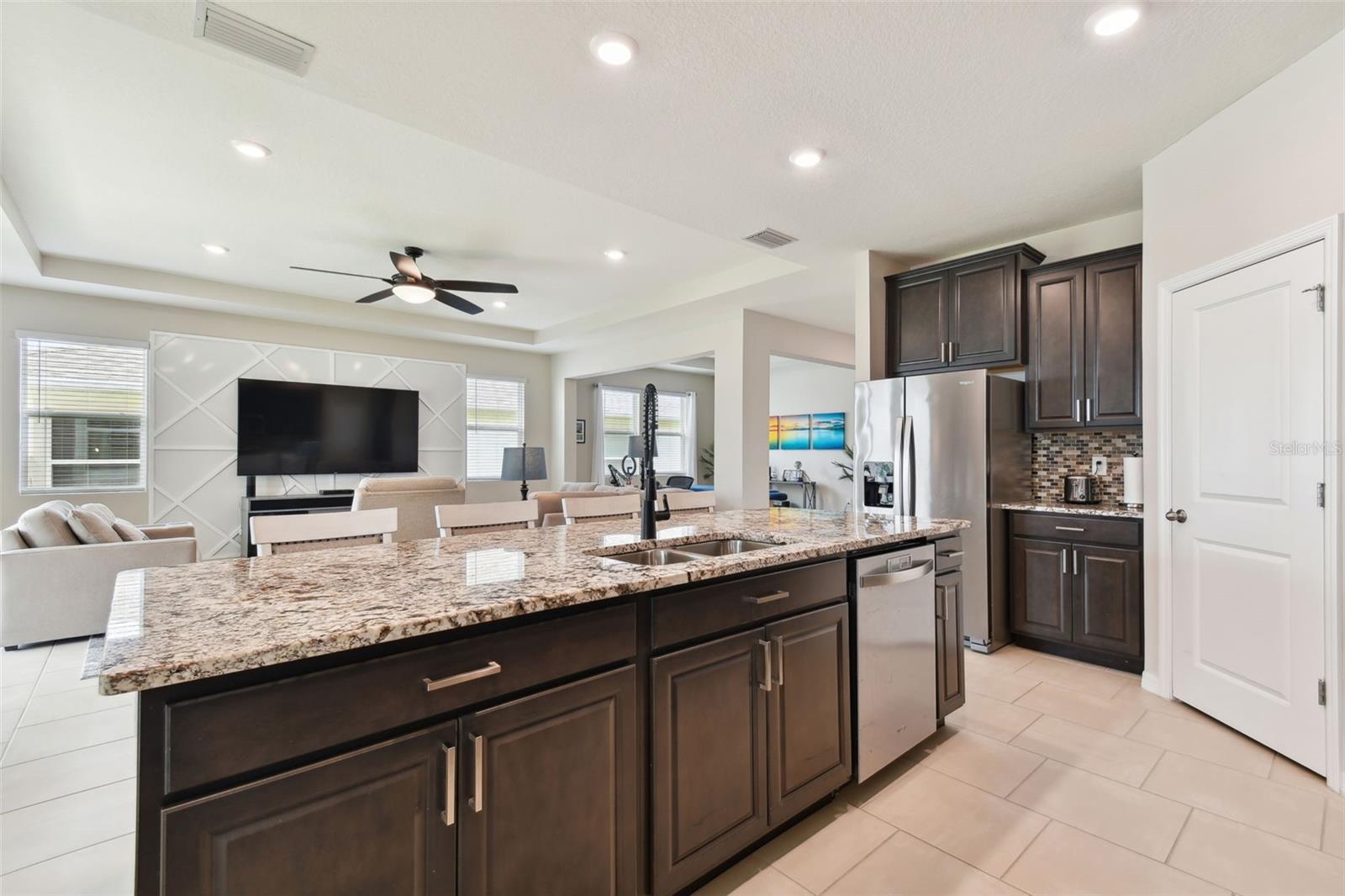 cooking with a view of the family room