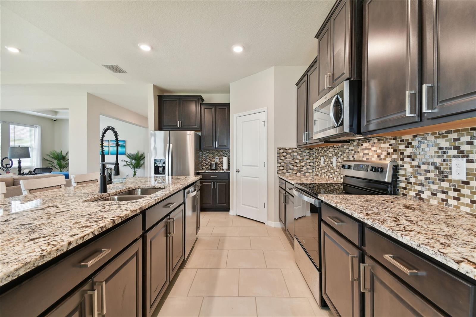 beautiful backsplash, hardware and faucet