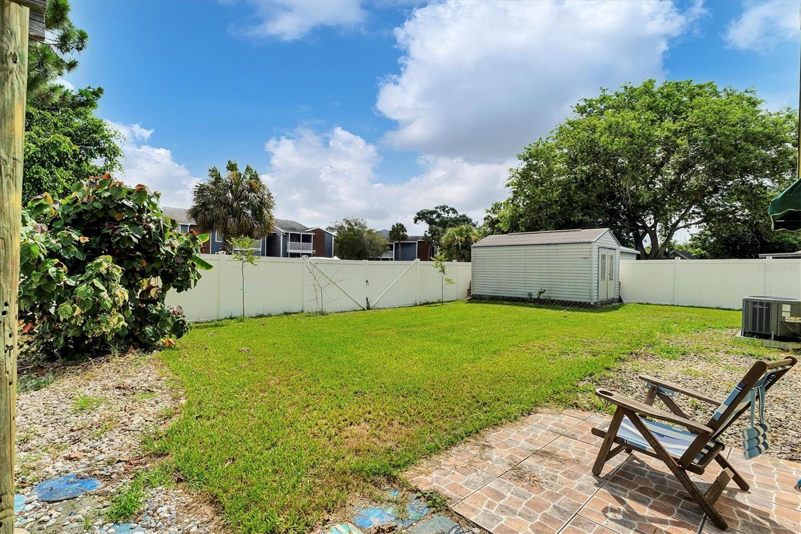 Double gated fence leading to access road