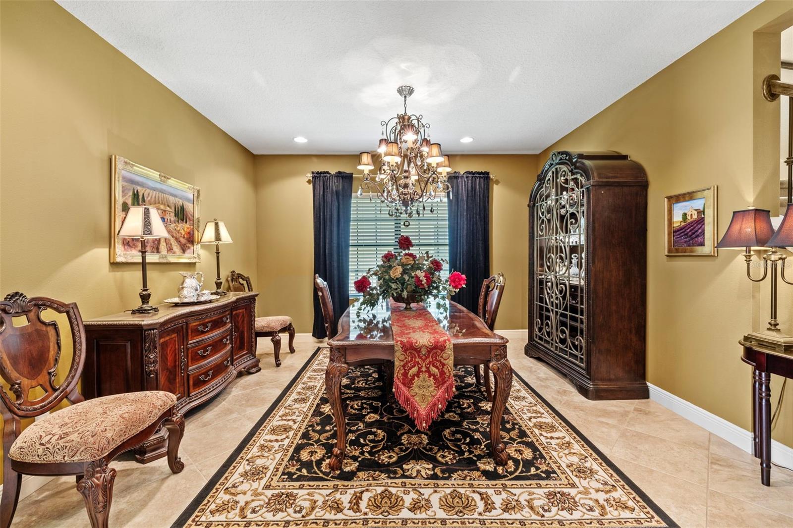 Formal dining room with custom chandeliers