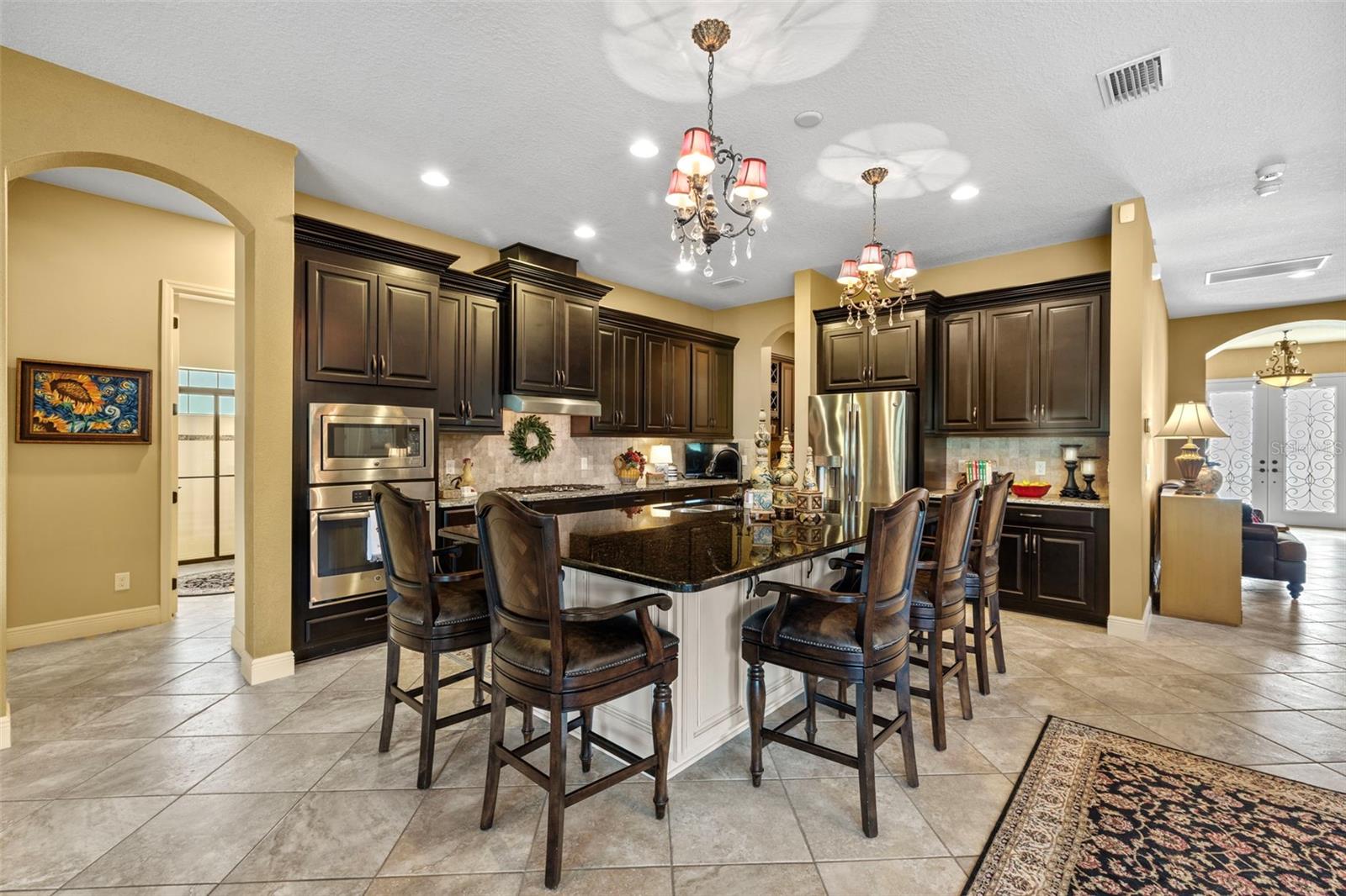 Gourmet chef's kitchen with custom solid wood cabinetry