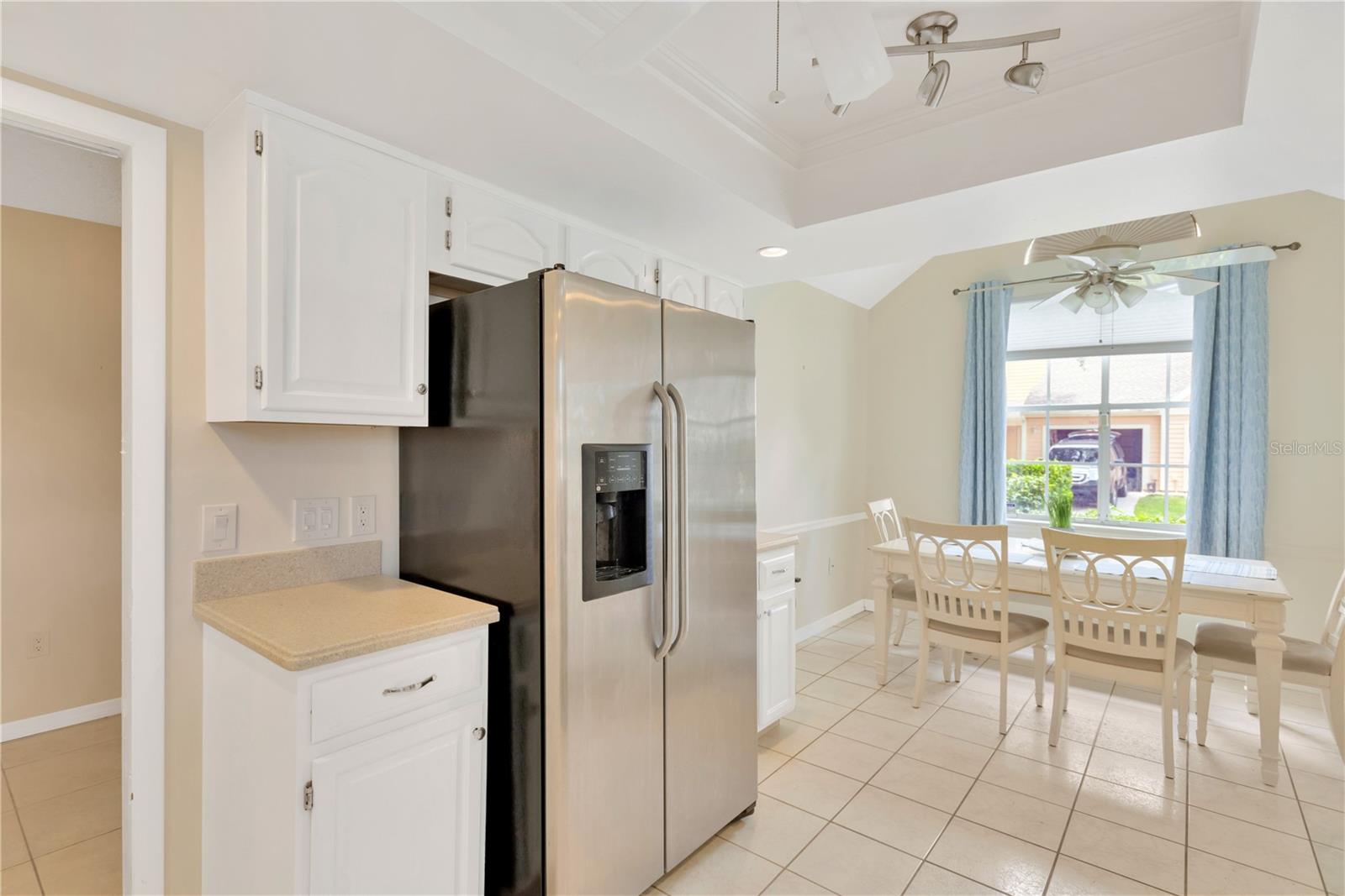 View of Kitchen, Dining Area and doorway to the "Flex Room" (converted garage).