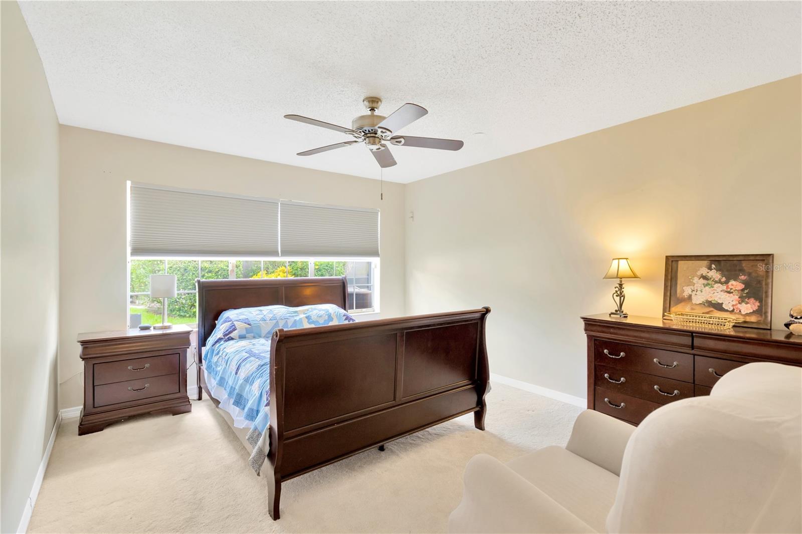 Primary Bedroom with Room for a King Size Bed (if bed is on the wall where dresser is now). Also, Walk-In Closet.