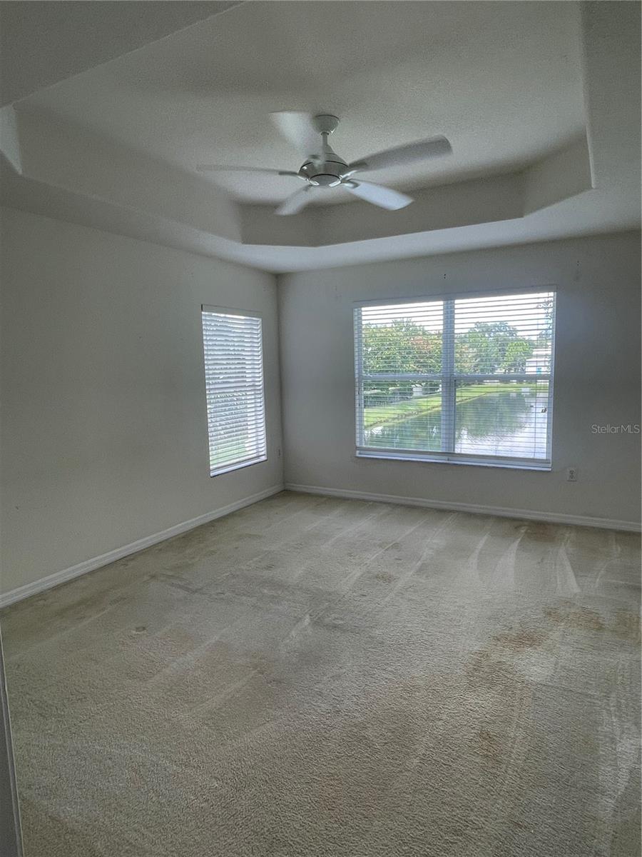 Master Bedroom with views of the pond/fountain