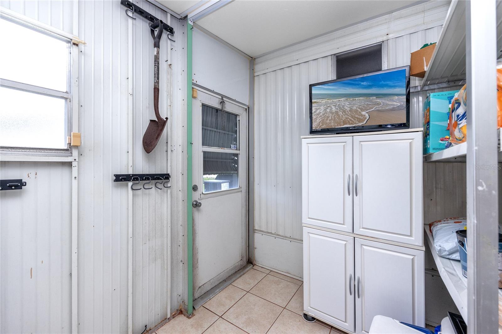 Space to store all the extra stuff in the laundry room.