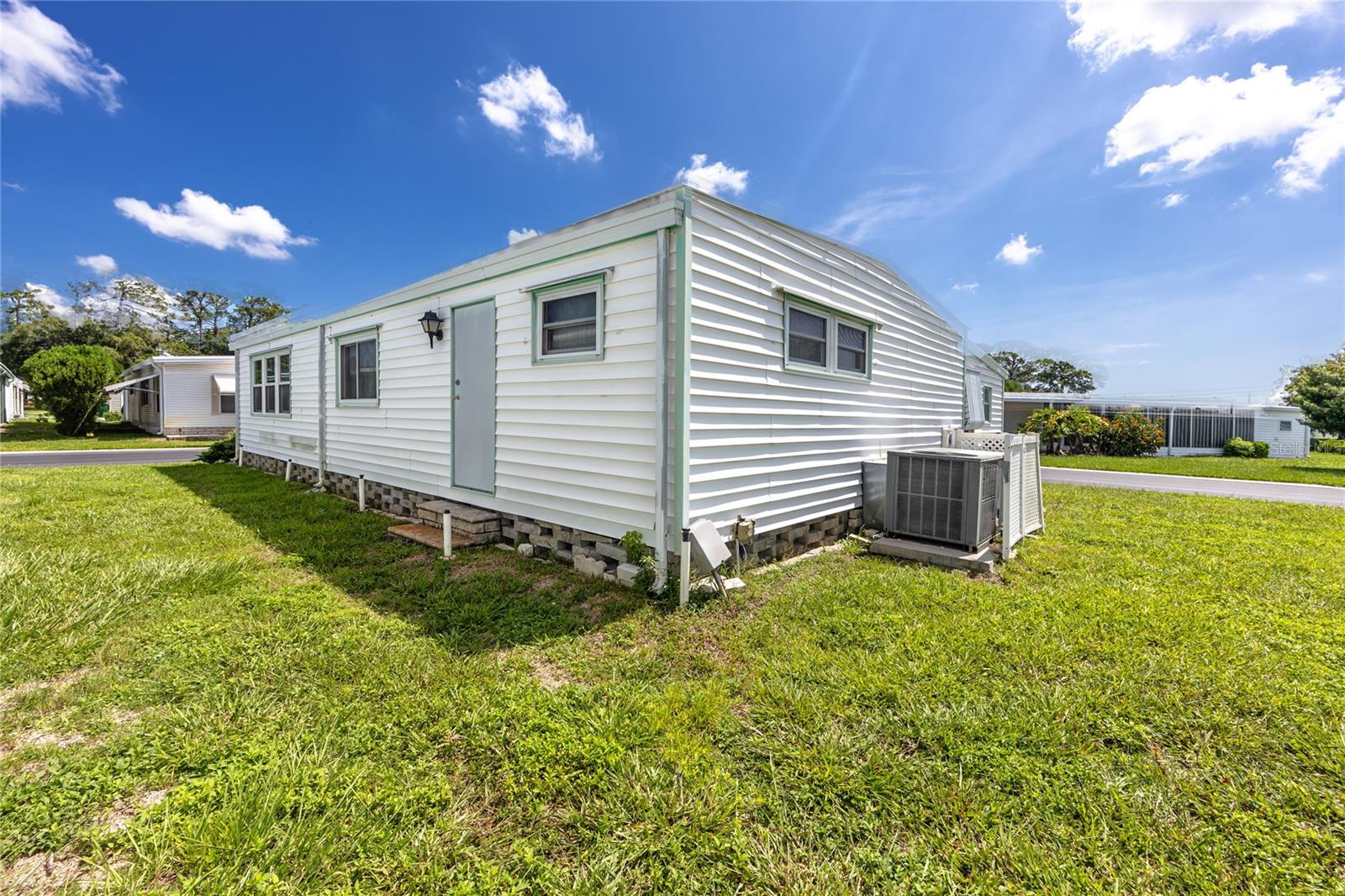 Corner lot provides privacy and a bit of green space.