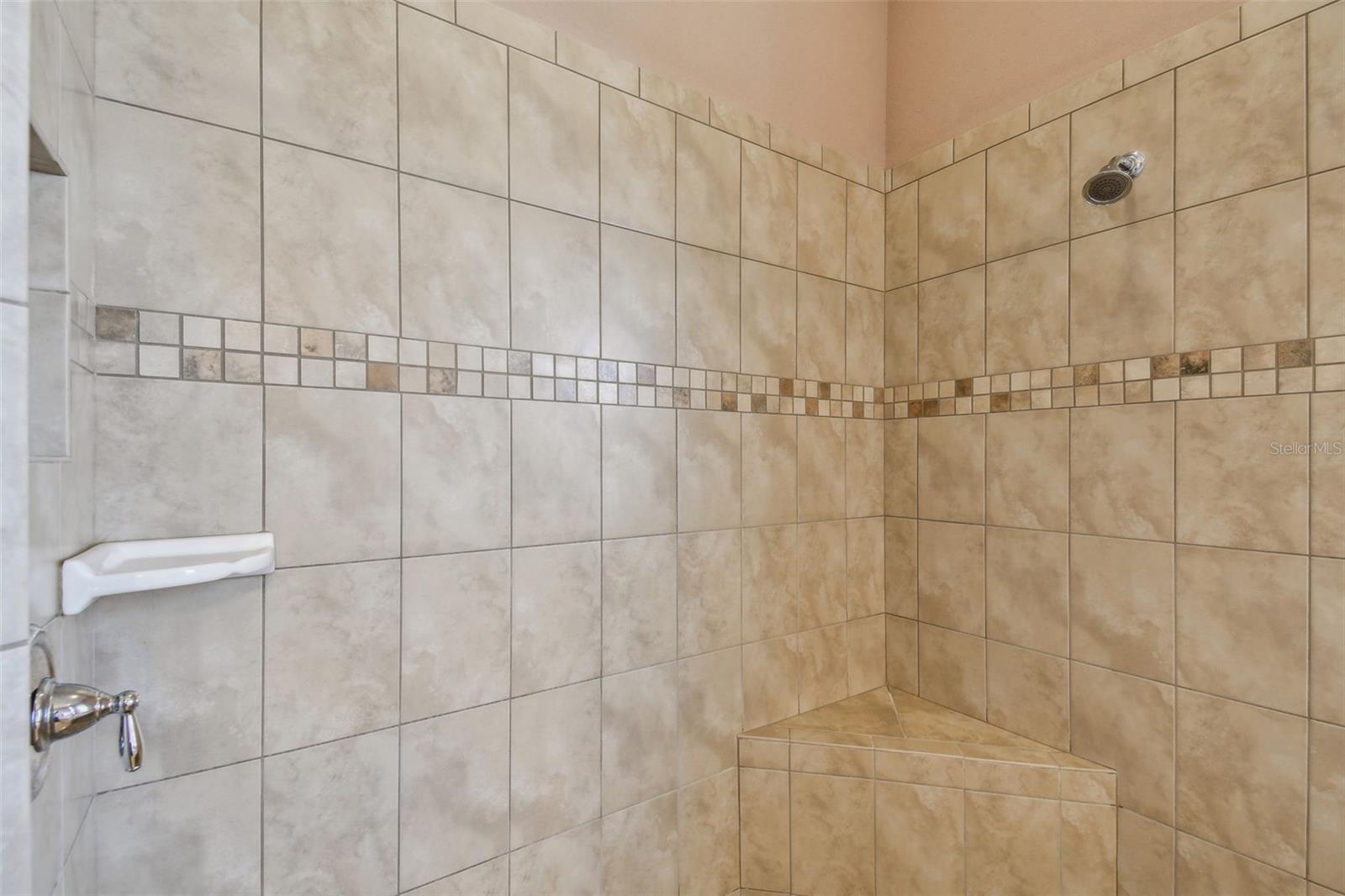 Master Bathroom with built-in corner bench