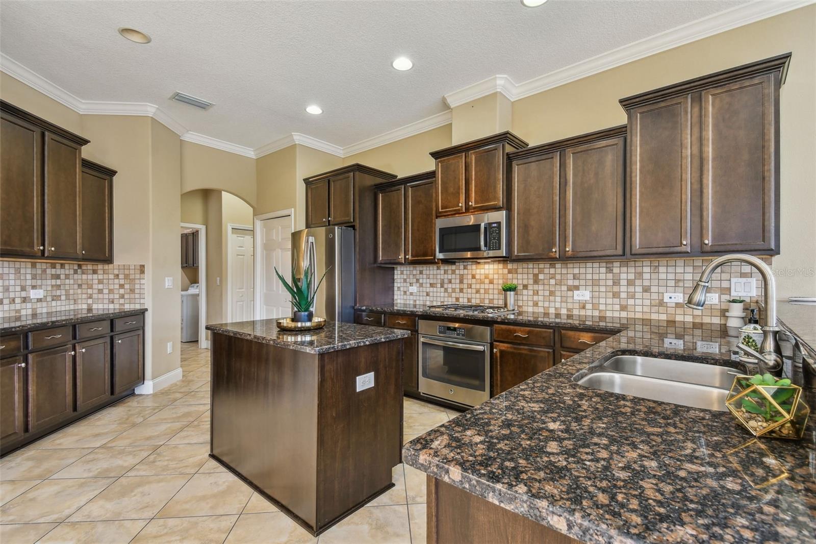 Spacious kitchen with multiple cabinets