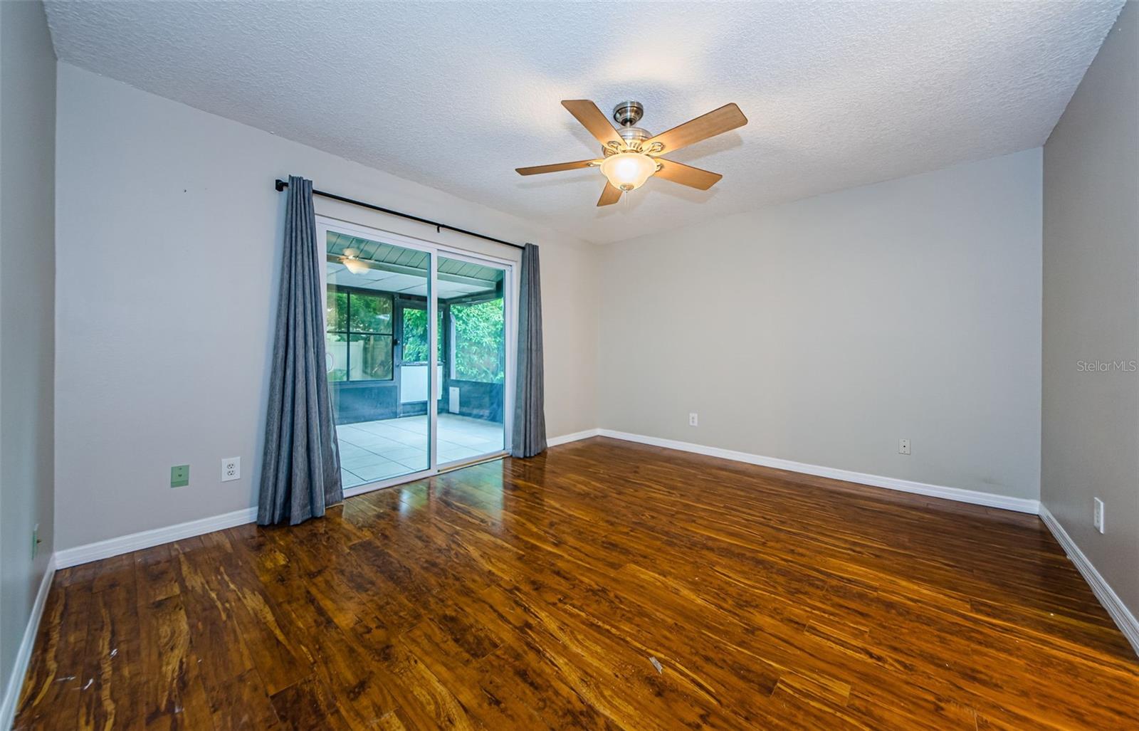 Primary Bedroom, leading to the Lanai...Perfect for Morning Coffee!!