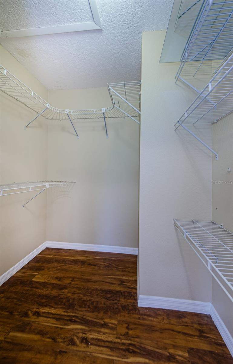 Primary Bedroom Walk in Closet