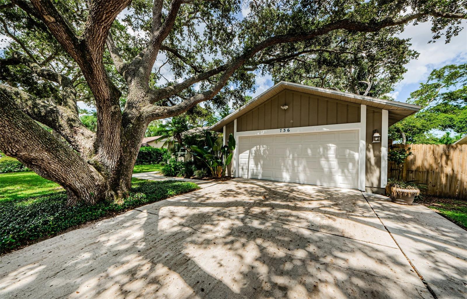 Large 2 car Garage, has washer and Dryer hookup, plenty of room!  To the Right of the garage is a gate with an 11x35 space in the yard to park a boat? or other "toy"