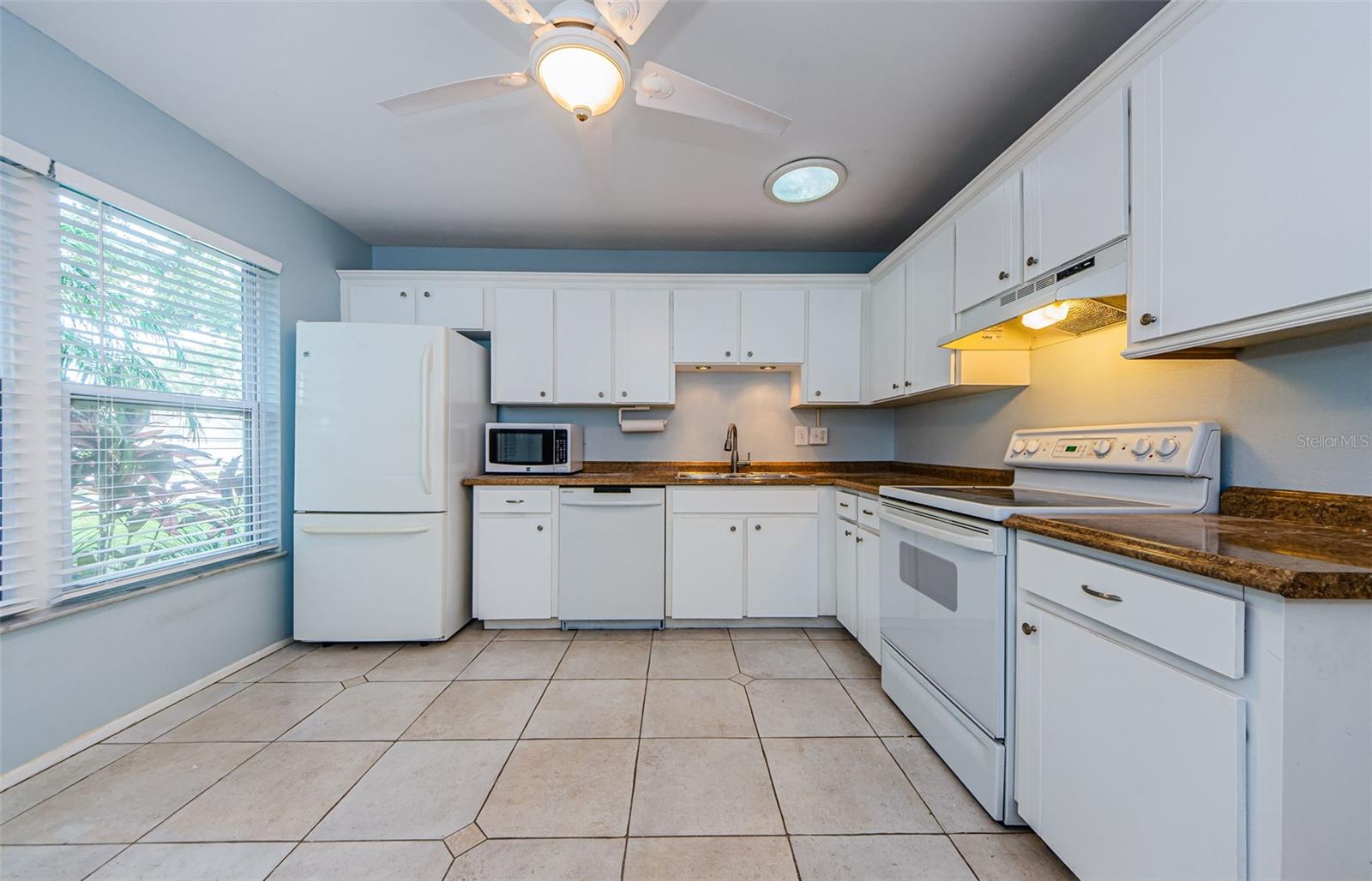 Large Kitchen, Lots of light!! The view is to the front yard.